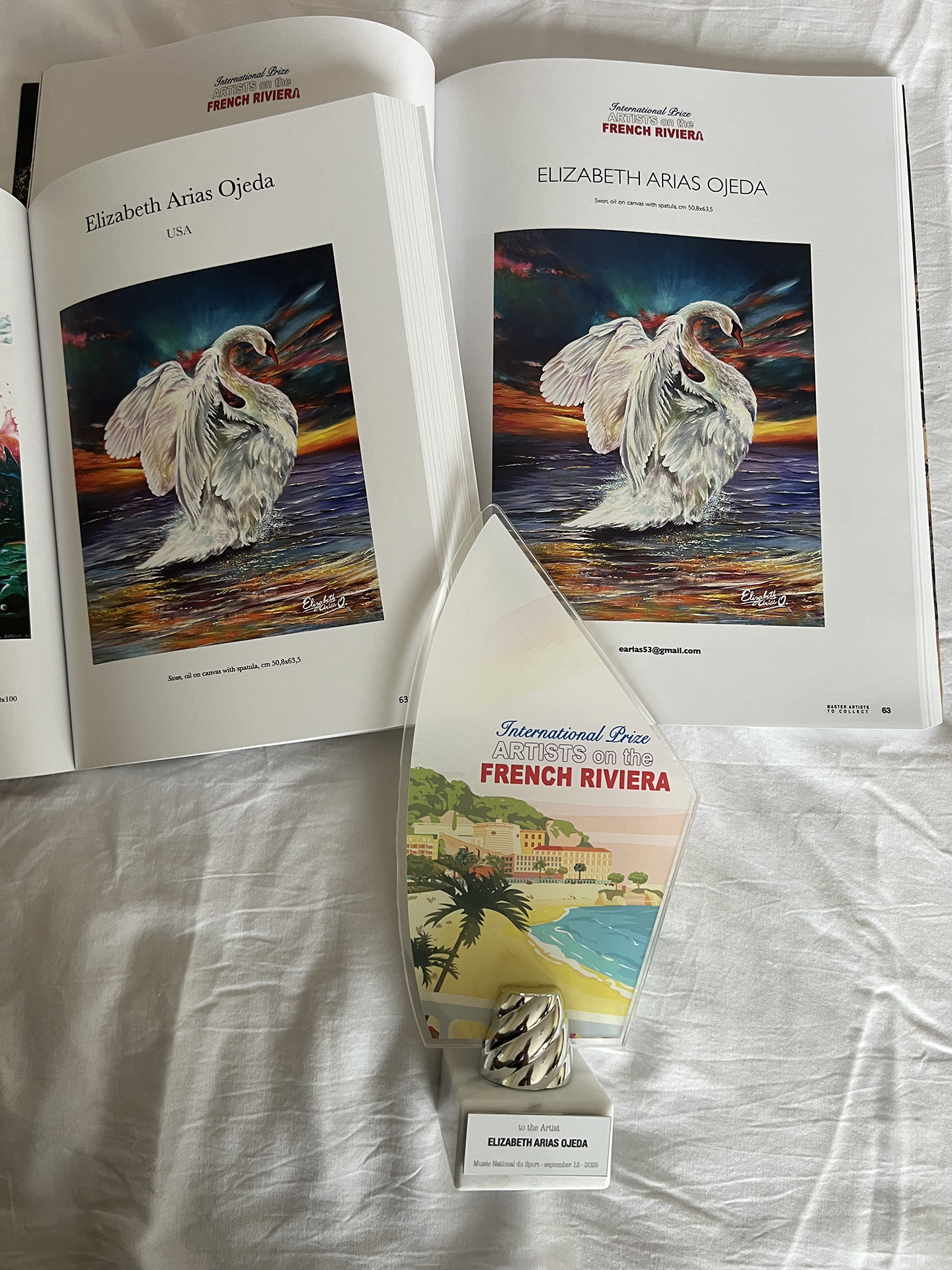 Obra en ambos libros y Trofeo